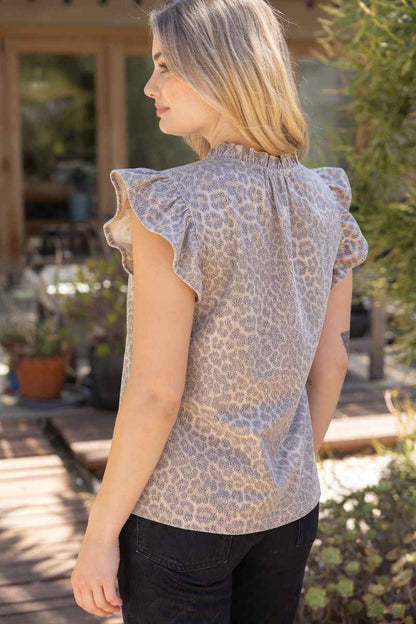 Wild Edge Ruffle Detail Leather Animal Print Top