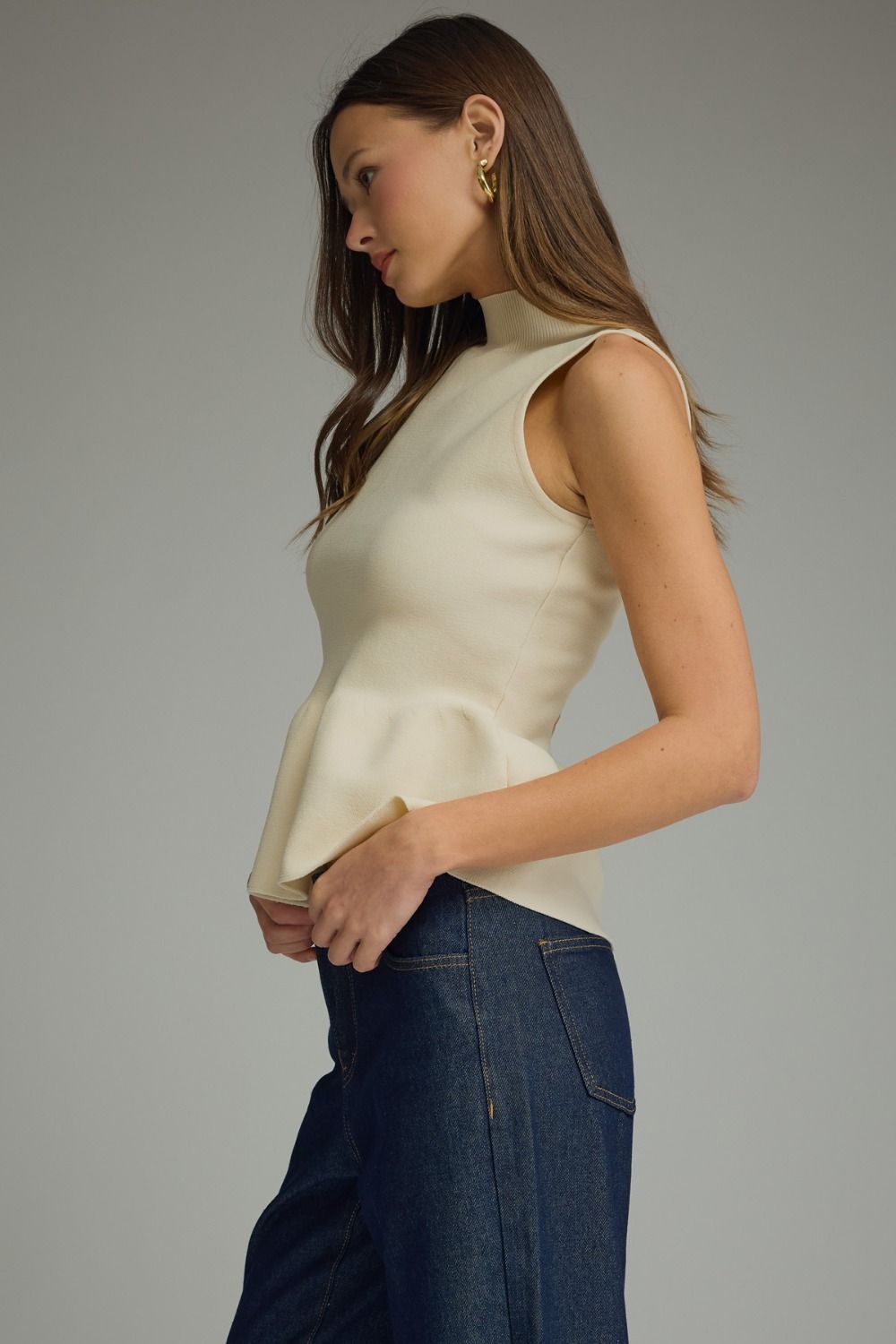 The Ecru Finesse Top | Sleeveless Mock Neck Peplum Top