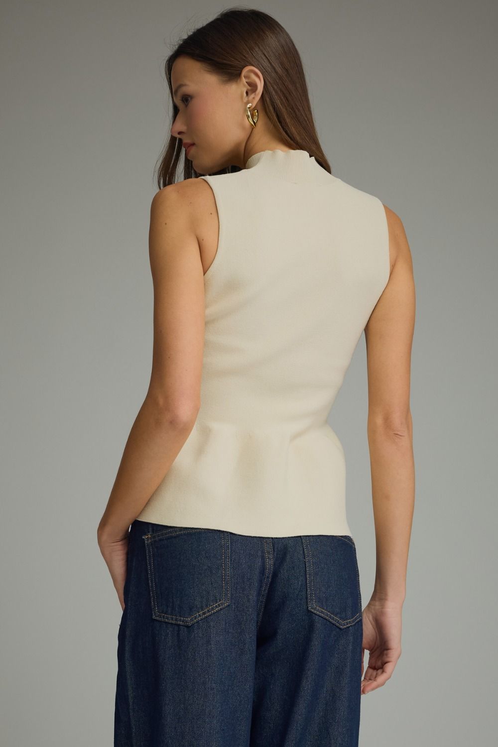 The Ecru Finesse Top | Sleeveless Mock Neck Peplum Top
