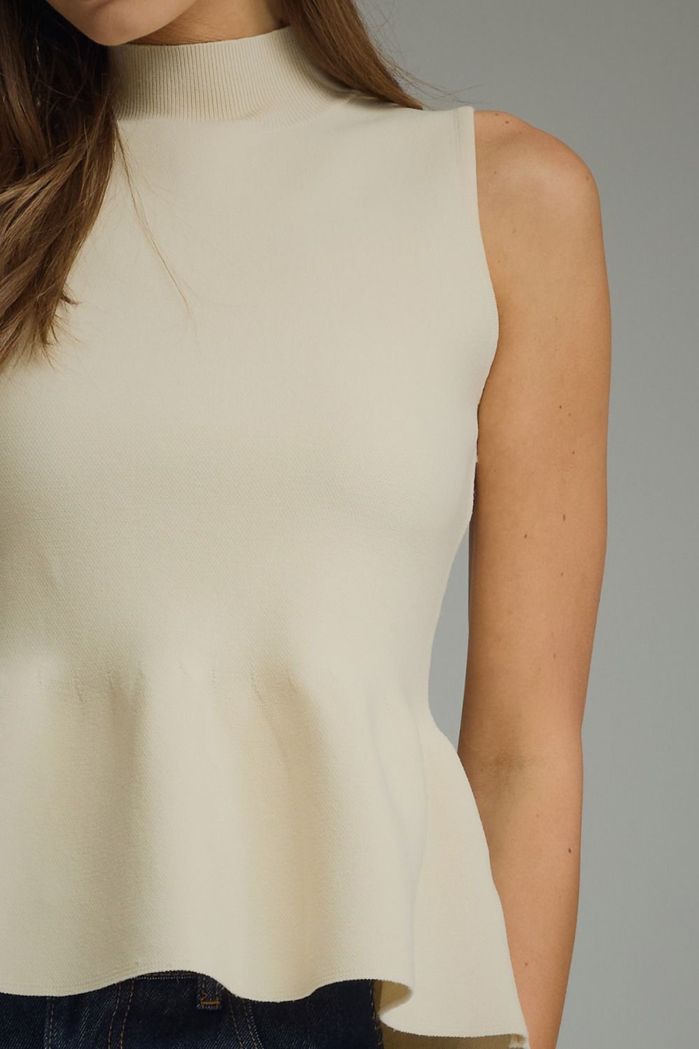 The Ecru Finesse Top | Sleeveless Mock Neck Peplum Top